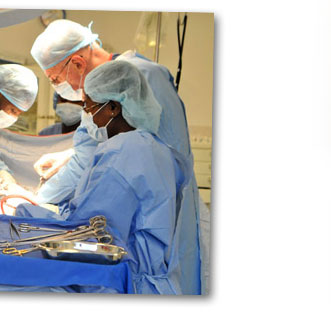Doctors at HSC Removing a Fibroid Uterus from a Patient