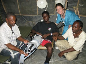 Haitian PT techs assisting with PPAM aid for amputee rehab